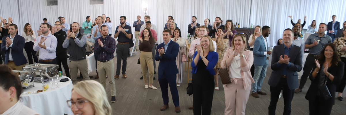 First American colleagues clapping