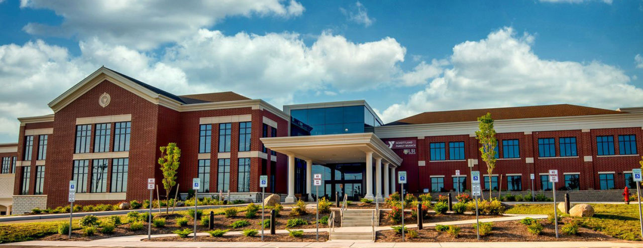 First American colleagues with Haysville School District outside in front of sign 