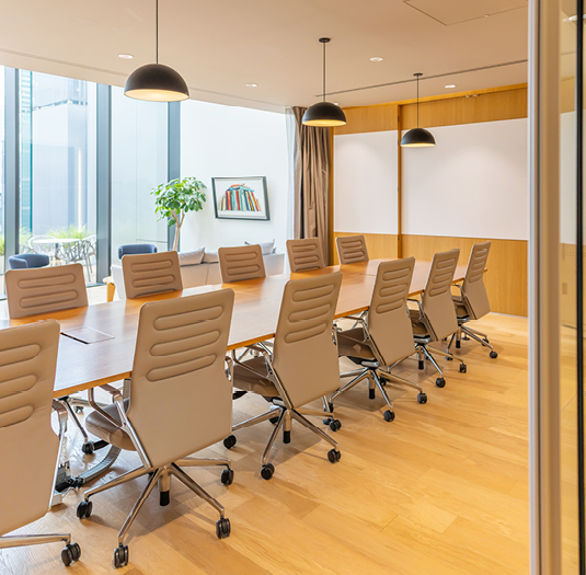 Team collaborating in modern conference room