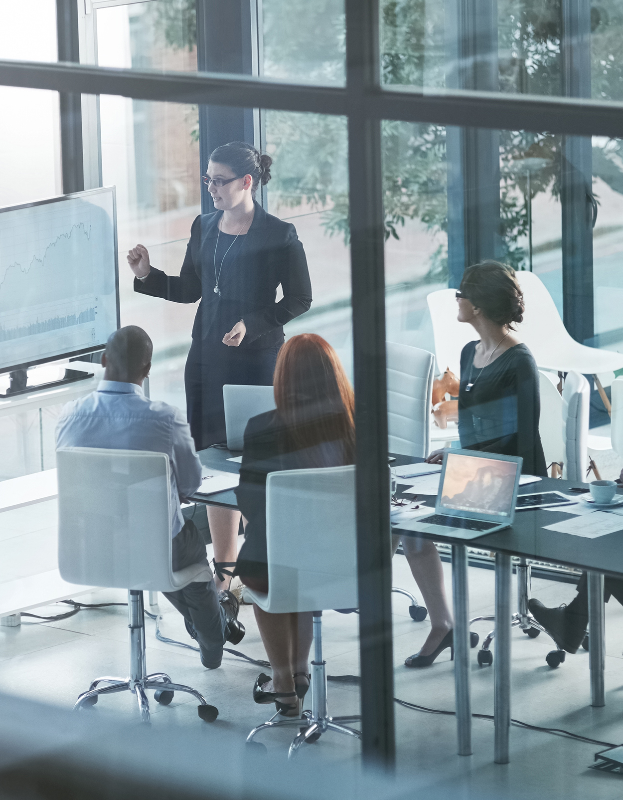 Colleagues looking at presentation.