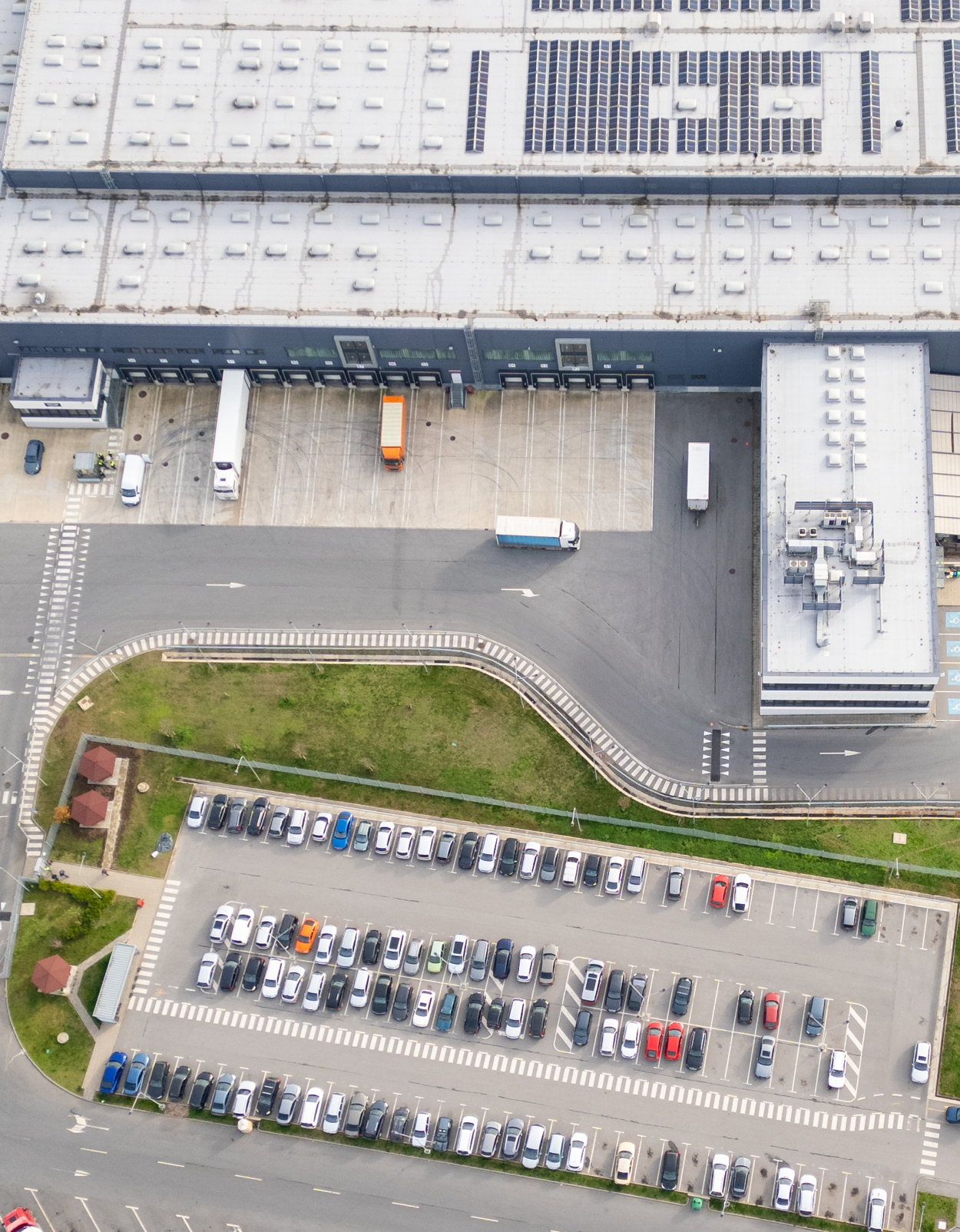 Warehouse and Distribution Trucks Parked Outside