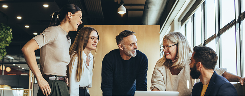 Group of colleagues working at table