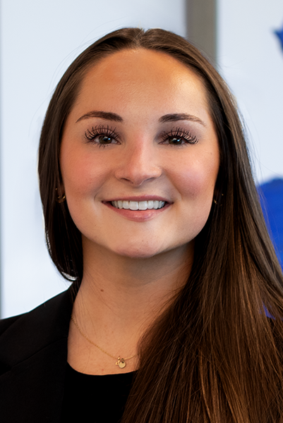 Teagan Carter's professional portrait.