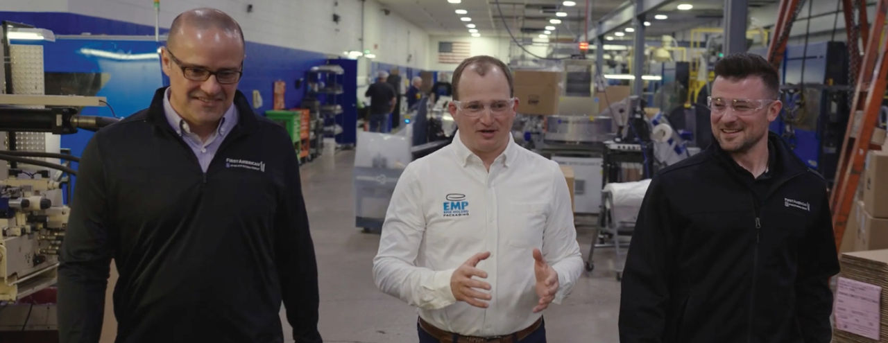 First American colleagues with Erie Molded Packing in the facility.