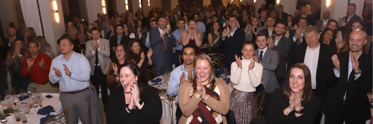 First American colleagues clapping and cheering
