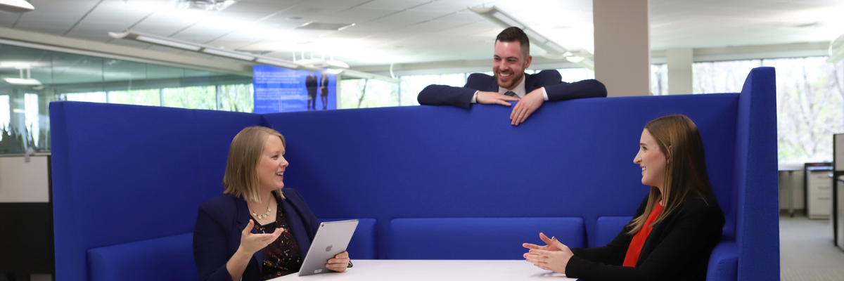 Colleagues collaborating in the office.