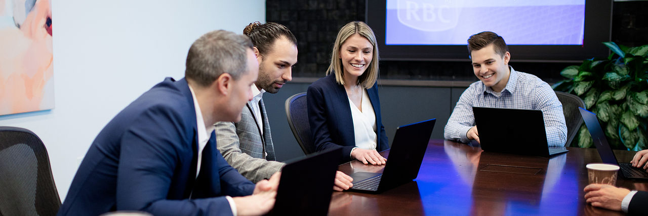 Business professionals in collaborative meeting